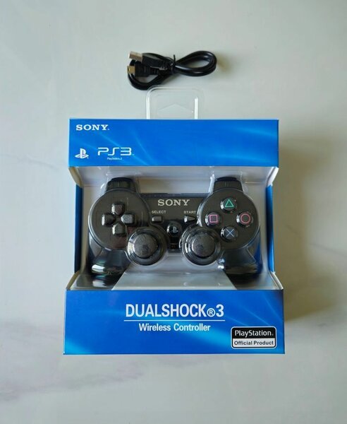 Manette PS3 + câble de recharg