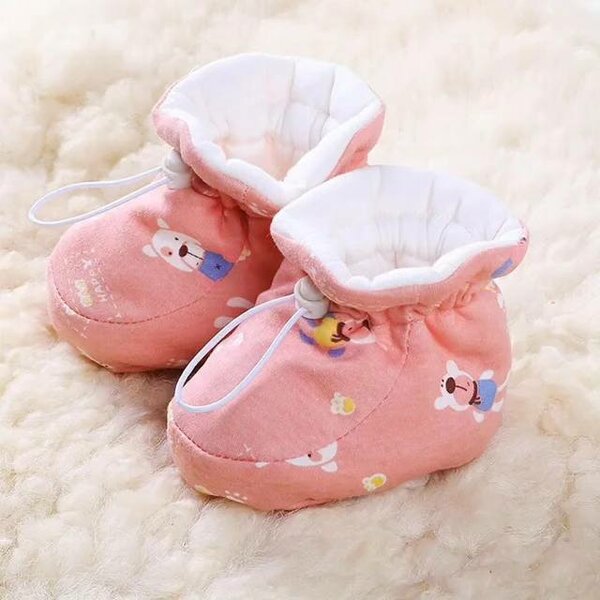 Beige soft slippers for children