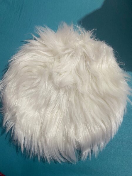 Coussin en fausse fourrure moelleux
