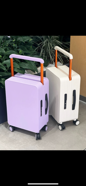 Valises colorées à roulettes