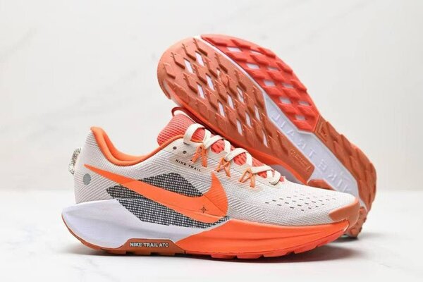 Chaussures de course Nike orange