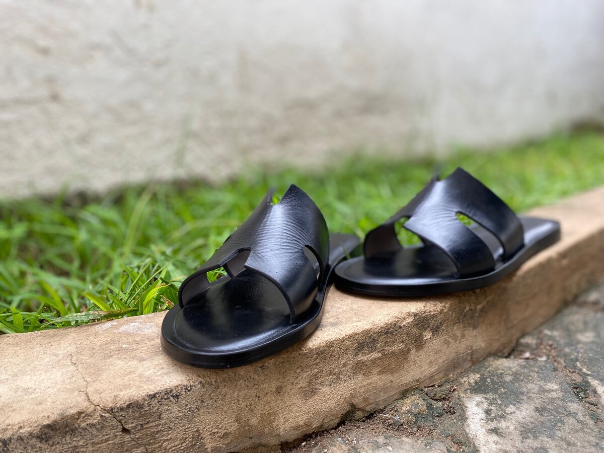 Black leather slides