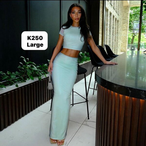 Women's suit, short top and long skirt