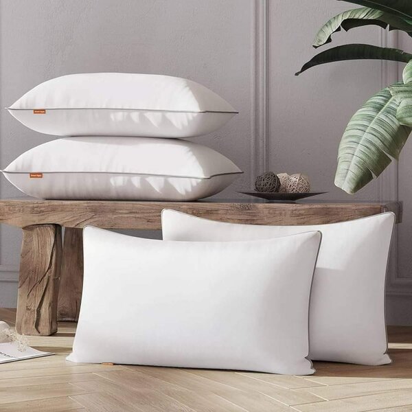 4 oreillers importés avec fermeture éclaires