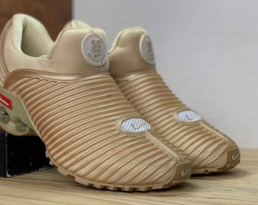 Nike sneakers 50 cent gold