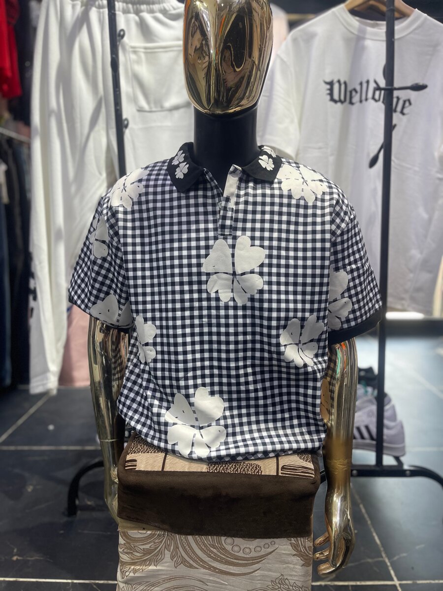 Polo chemise à motifs floraux