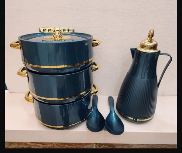 setting with 3 ceramix pots, 2 spoons with a jug, dark green