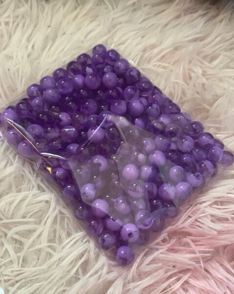 Sachets de perles violettes