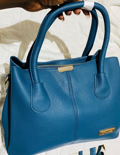 Women's tote bag made of textured eco-leather with gold fittings