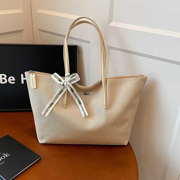 Sac Lacoste élégant beige