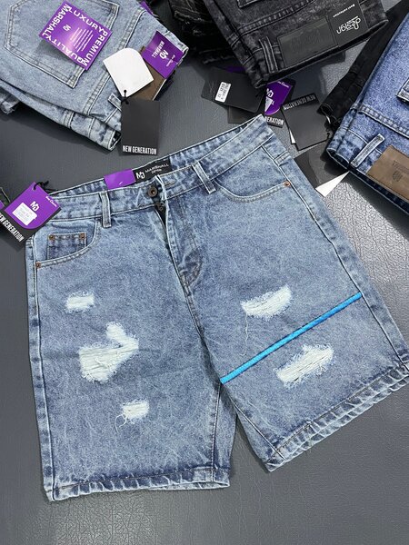 Shorts en jean déchirés homme