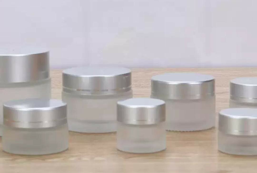 Cosmetic glass bottles, jars,