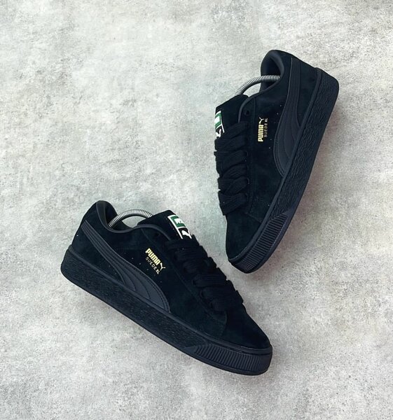 Puma noires en daim élégantes