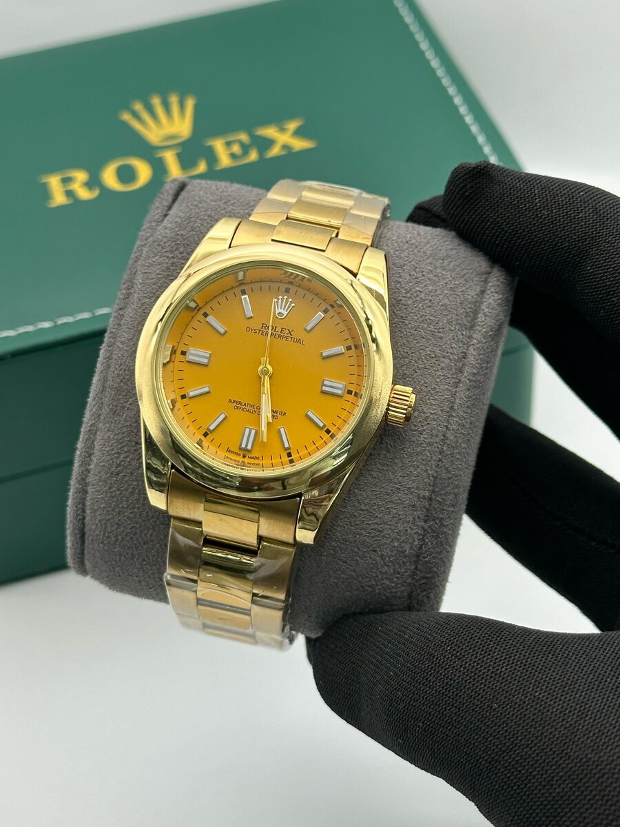 Montre Rolex Dorée Élégante