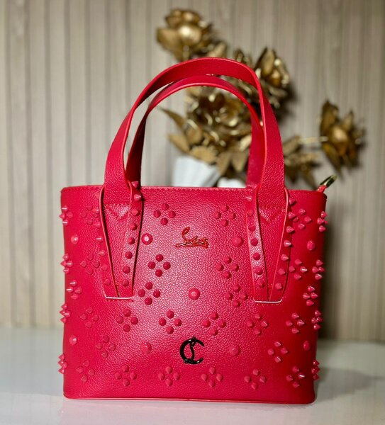 Sac à main rouge floral élégant