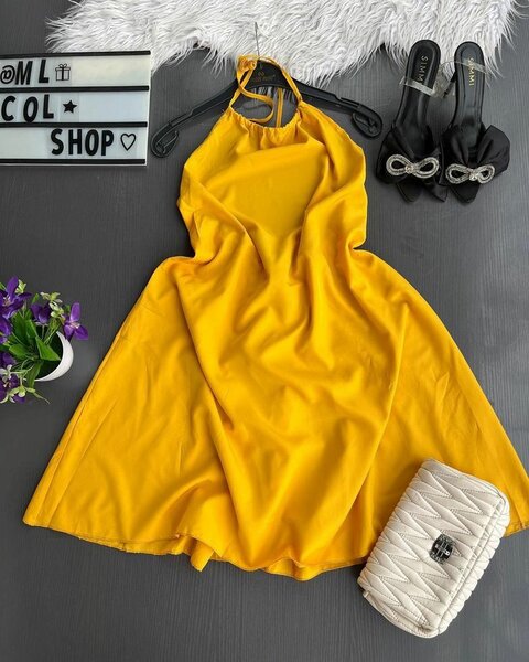 yellow halter neck, fit and flare dress