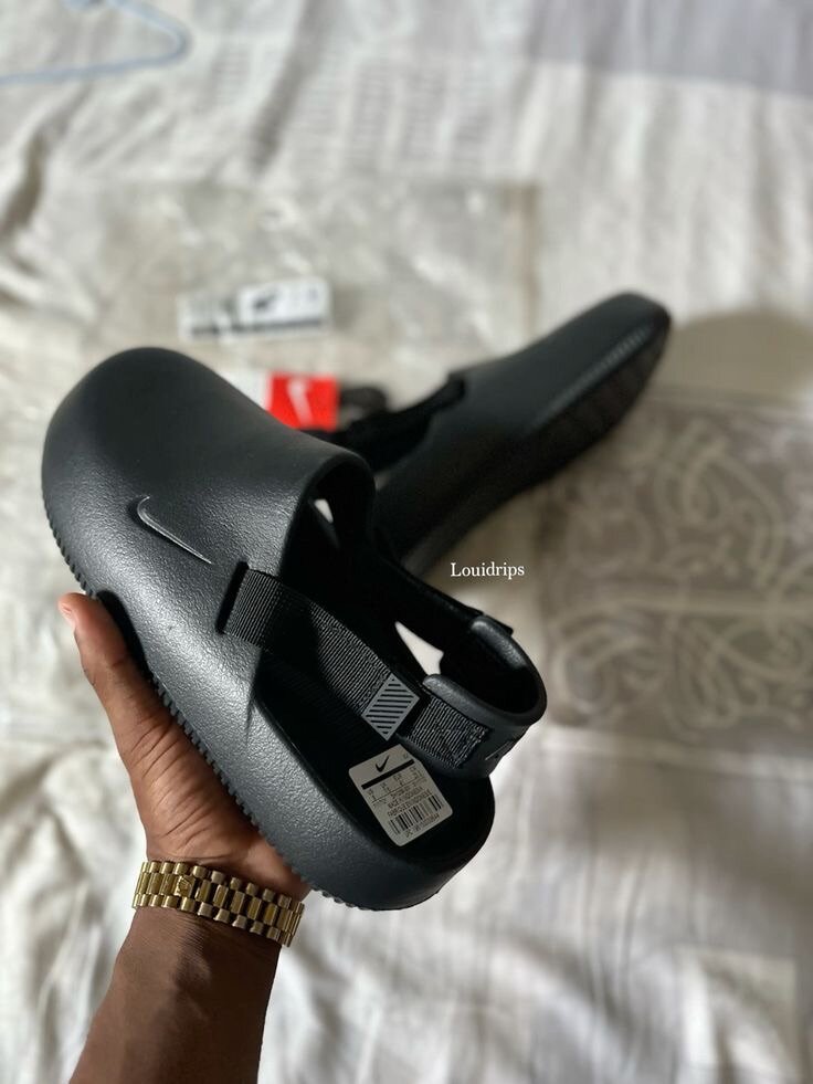 Mules de sport noires Nike