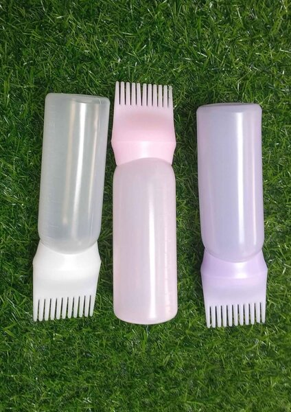 Bouteilles applicatrices à peigne