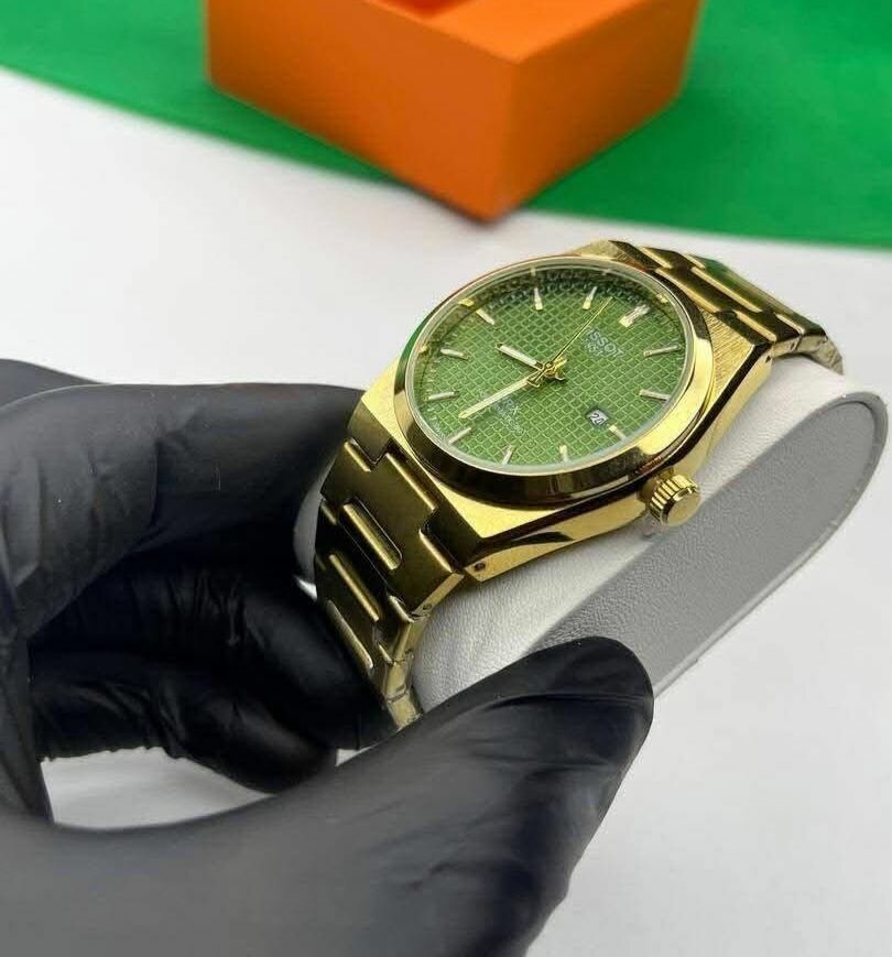 Montre homme en acier doré