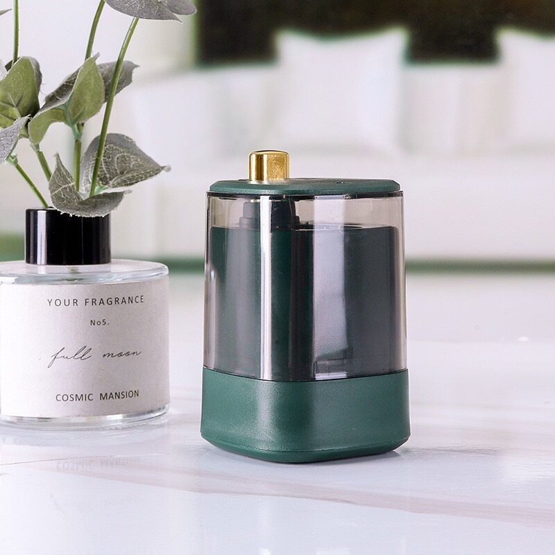 Self dispensing toothpick container with toothpicks