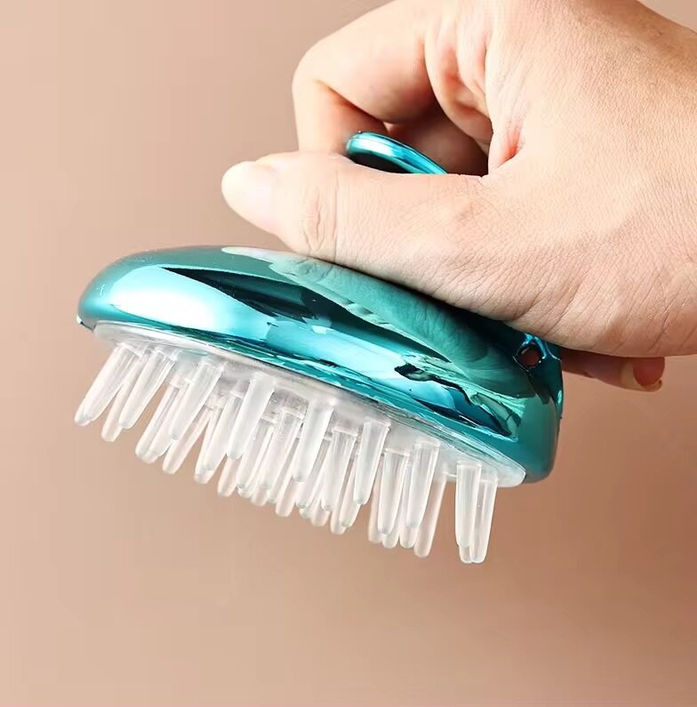 Brosse de massage pour cuir chevelu