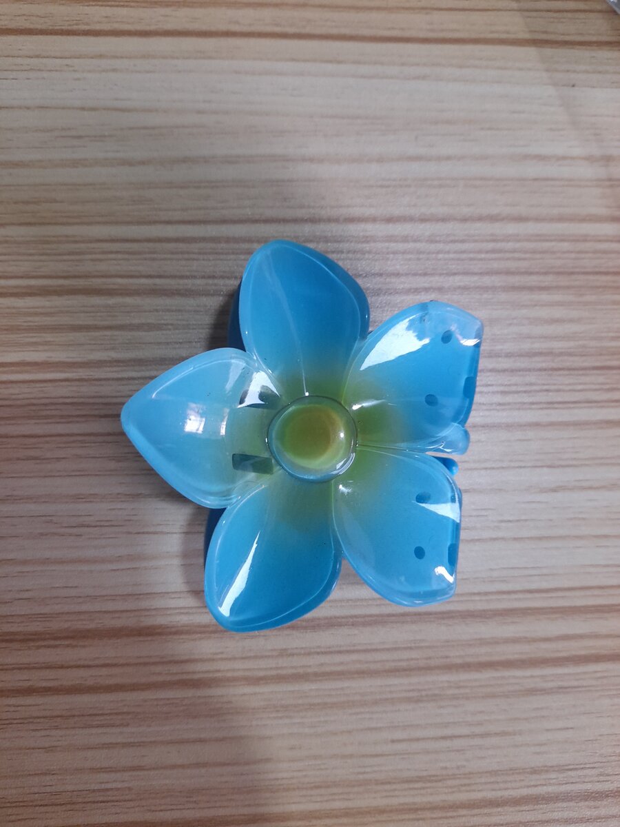 Pince à cheveux fleur bleue