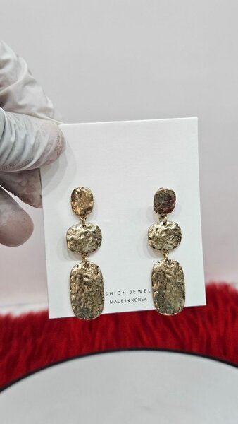 Boucles d'oreilles dorées tendance