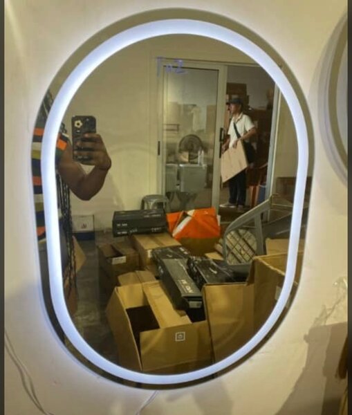 Mirror with three different lights