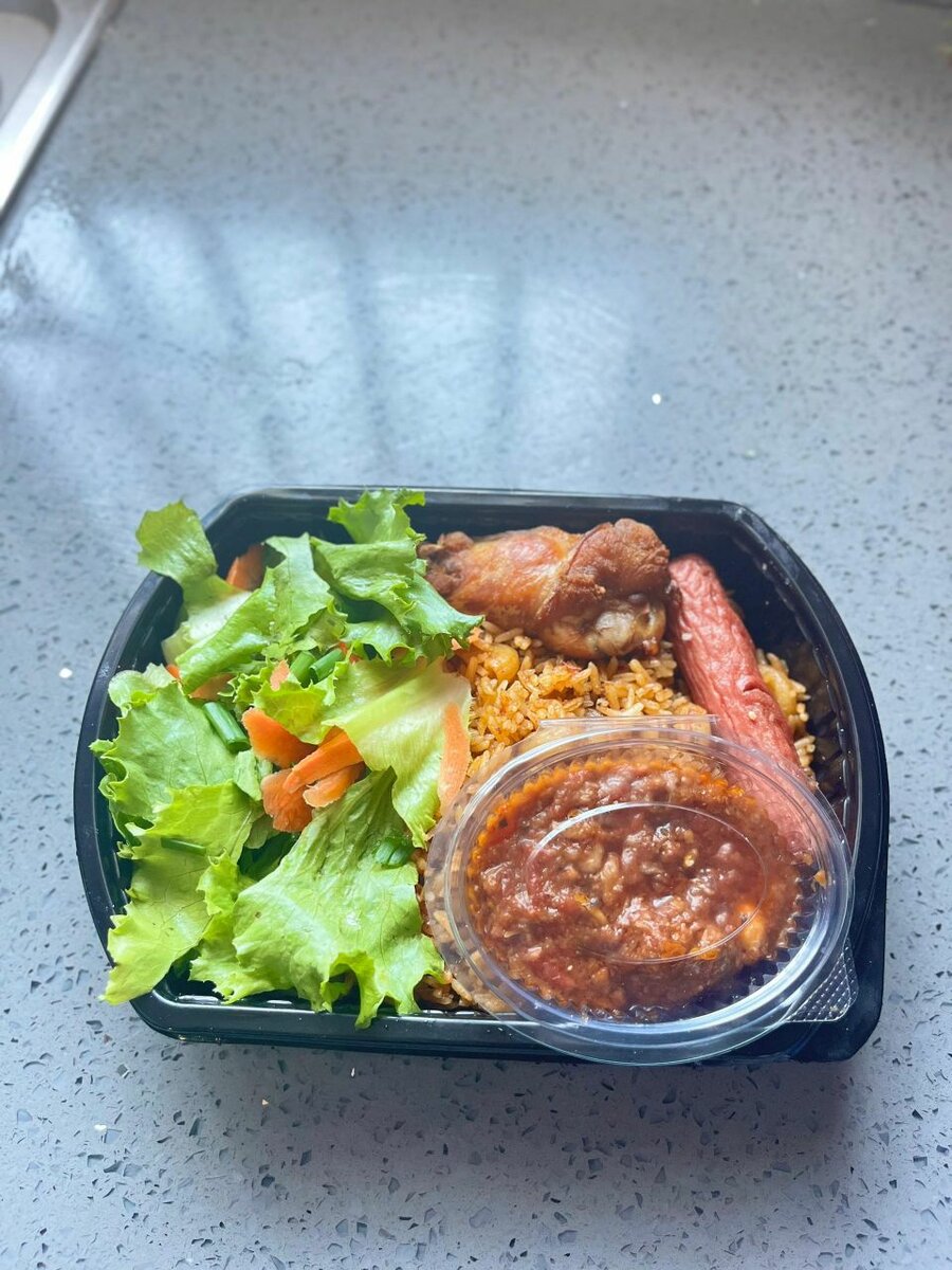 Jollof , fried rice . Angwamoo