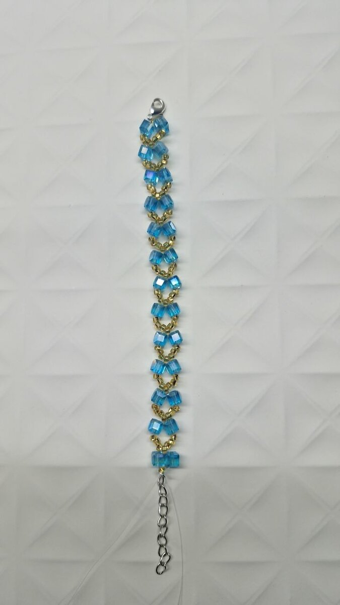 Bracelet perles bleues dorées