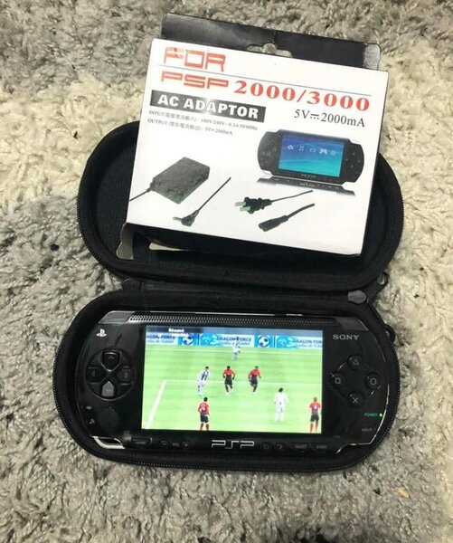 PSP 2000/3000 with AC Adapter