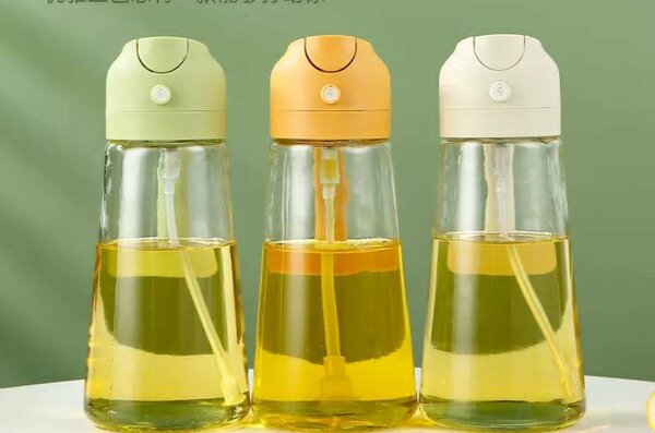 Oil dispensing bottle