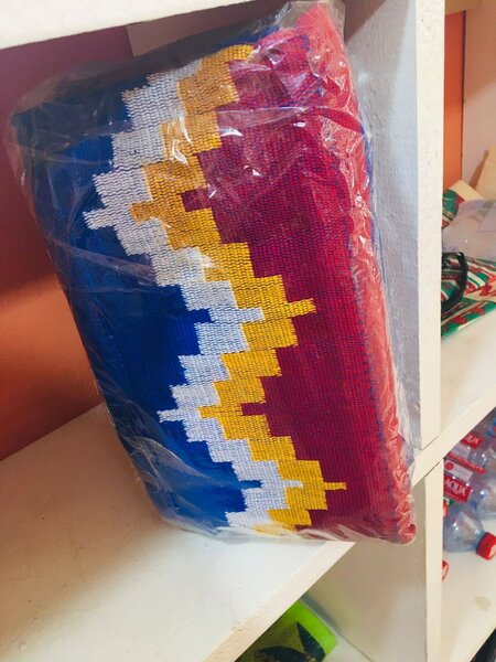 Woman Kente located at mataheko pharmacy  all kinds of Ashan