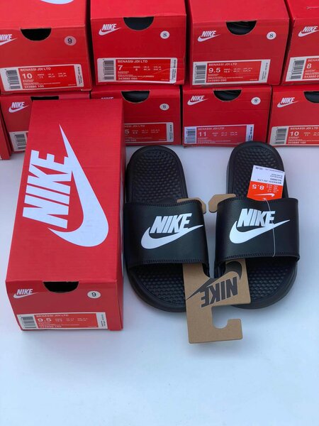 Nike flip-flops are black