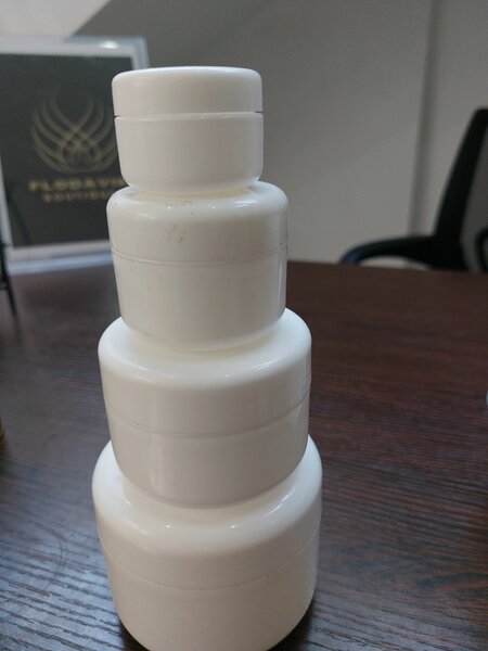 White jars with inner covers