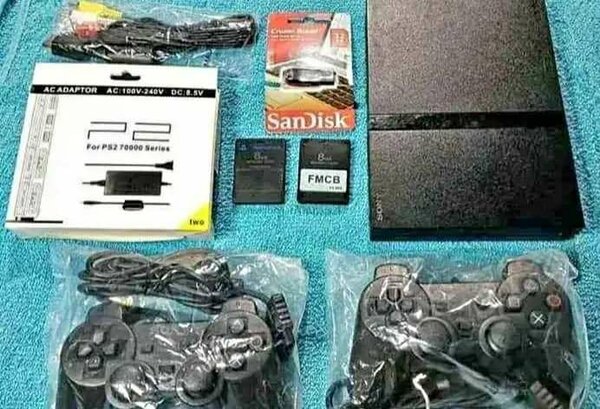 Console PS2 avec accessoires