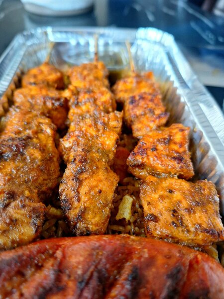 Jollof With Grilled Chicken khebabs
