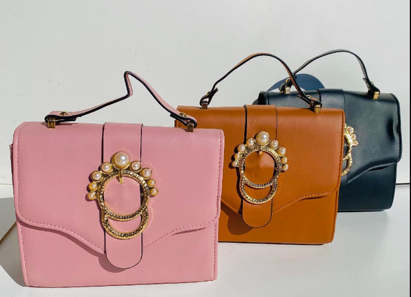 Women's bag with handle, decorated with pearl buckle, in three colors (pink, brown, black)