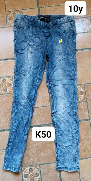 blue jeans for a teenager with an elastic band