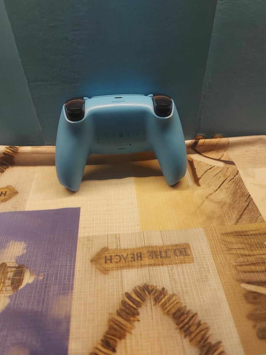 Manette de jeu sans fil bleue