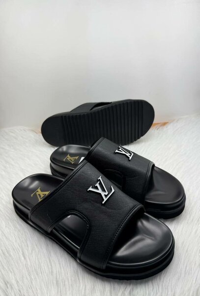Mules Louis Vuitton en cuir noir