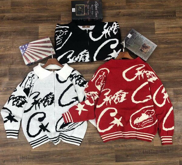 Veste en tricot à capuche et fermeture éclair