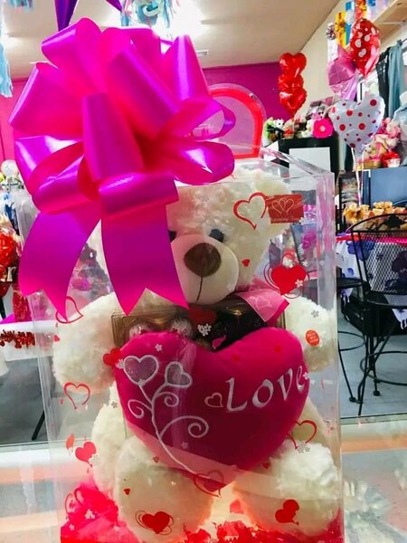 Ours en peluche rouge blanc