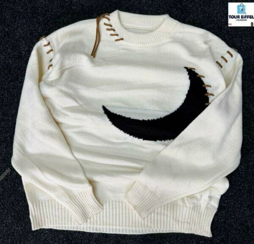 Pull col rond à motifs géométriques