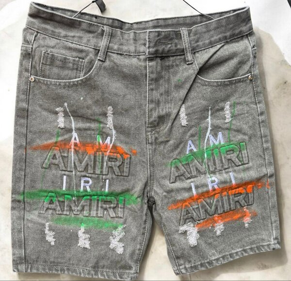 Amiri shorts en jeans gris déchirés