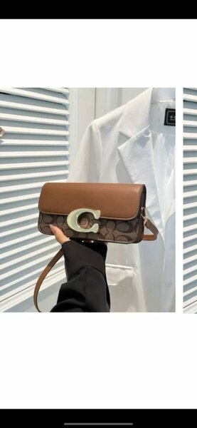 Sac à main marron en cuir avec motif