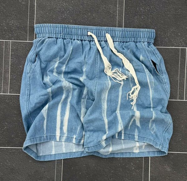 Shorts en jean délavé pour homme