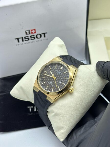 Montre Tissot homme en or