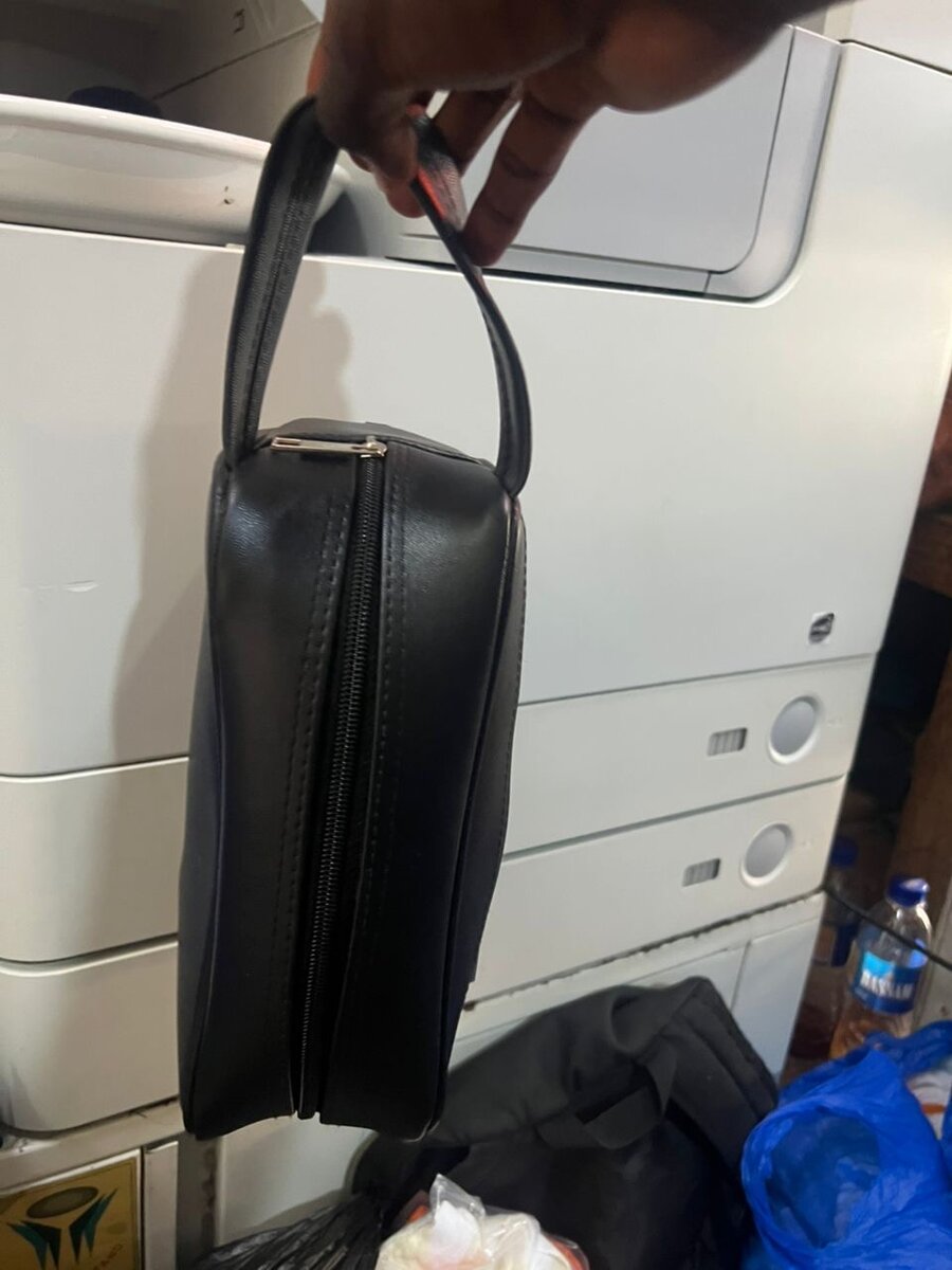 Trousse de toilette en cuir