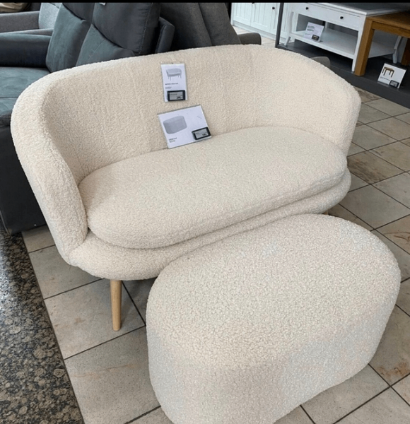 Fauteuil design en tissu bouclé crème